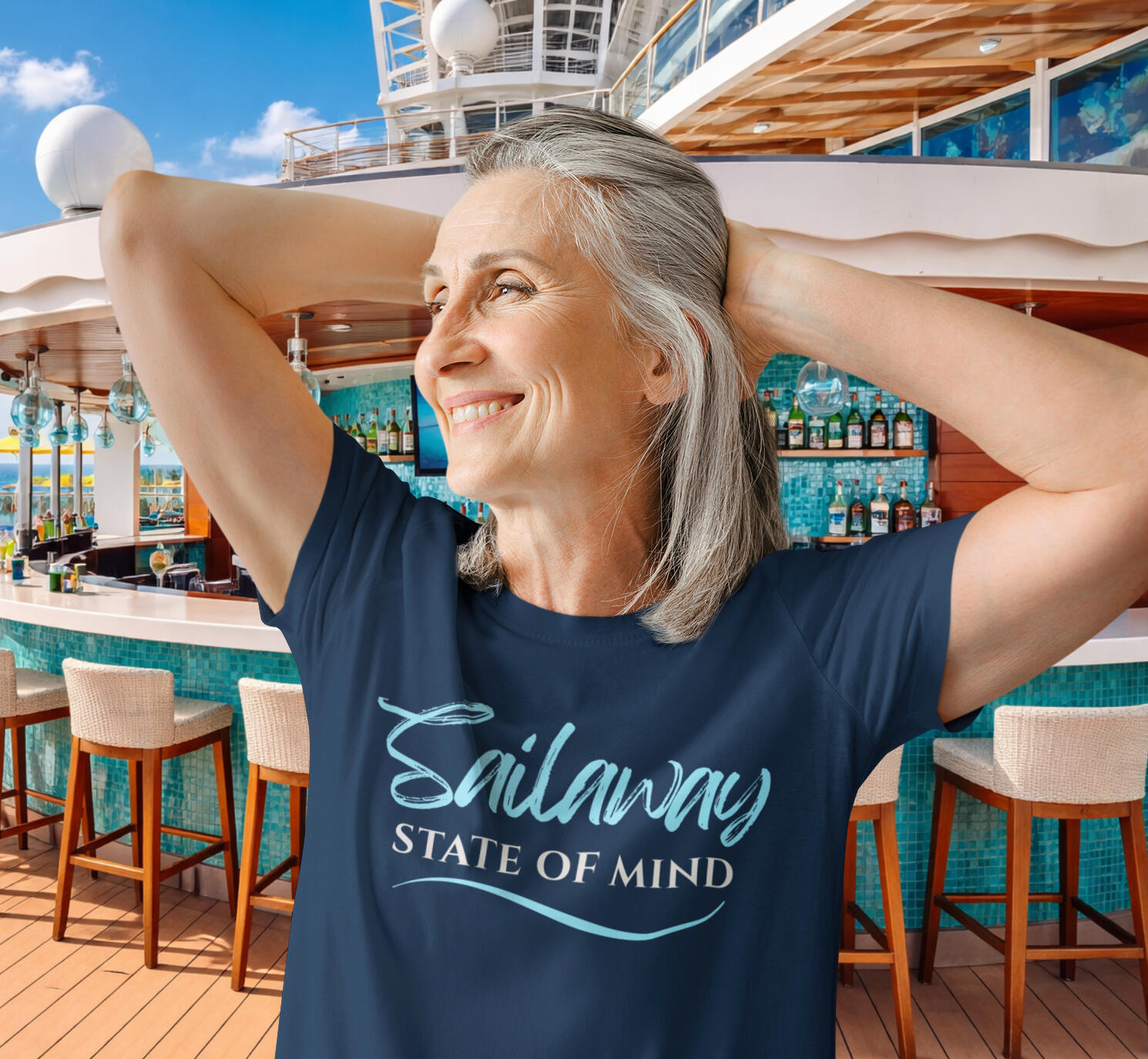 Sailaway State of Mind Navy Cruise T Shirt Woman wearing a navy Sailaway State of Mind cruise T-shirt in a cruise bar setting